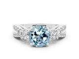 White gold Round Cut Aquamarine Three-Stone Ring with Pavé Split Shank and Four-Prong Setting