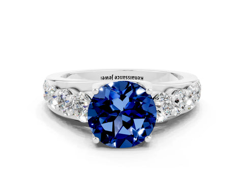White gold Round Cut Blue Sapphire Engagement Ring with Pavé Band and Four-Prong Setting