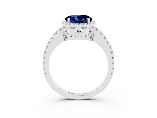 Platinum Round Cut Blue Sapphire Halo Engagement Ring with Pavé Band and Prong Setting
