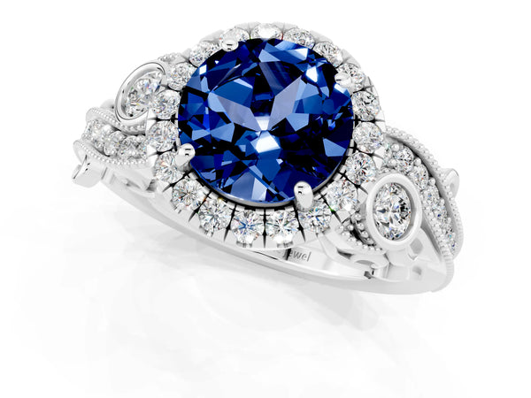 Silver Round Cut Blue Sapphire Halo Ring with Milgrain Pavé Band and Four-Prong Setting