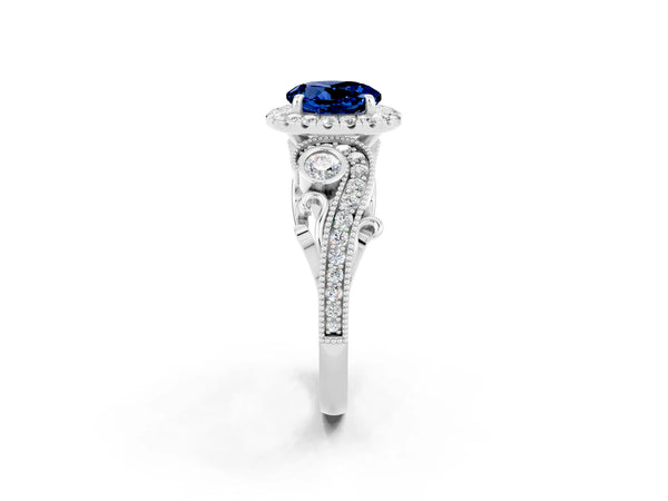 Platinum Round Cut Blue Sapphire Halo Ring with Milgrain Pavé Band and Four-Prong Setting