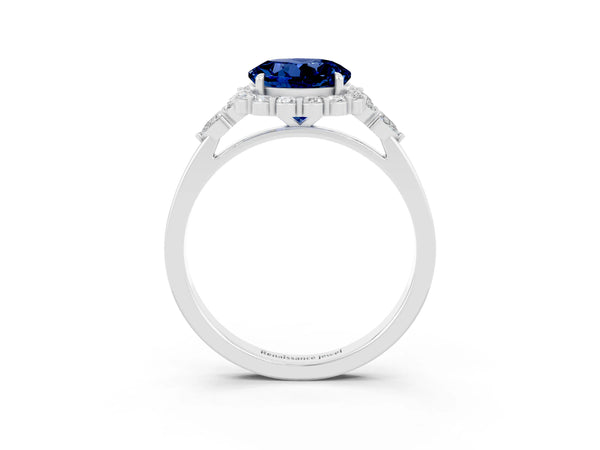 Platinum Round Cut Blue Sapphire Halo Ring with Pear Side Stones and Prong Setting