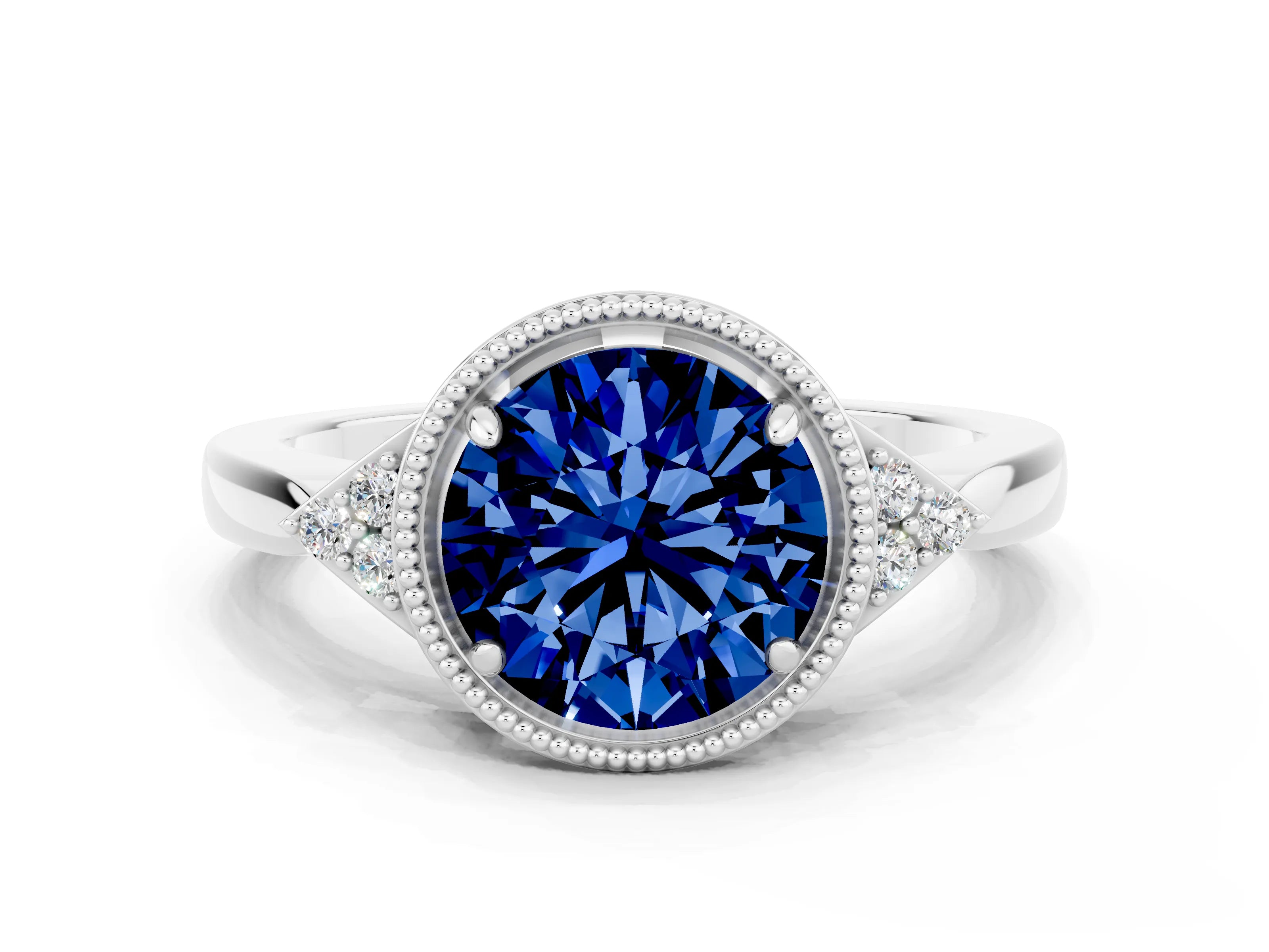 White gold Round Cut Blue Sapphire Halo Ring with Tapered Band and Four-Prong Setting
