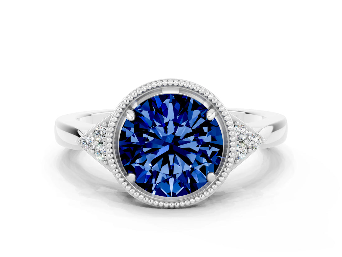 White gold Round Cut Blue Sapphire Halo Ring with Tapered Band and Four-Prong Setting