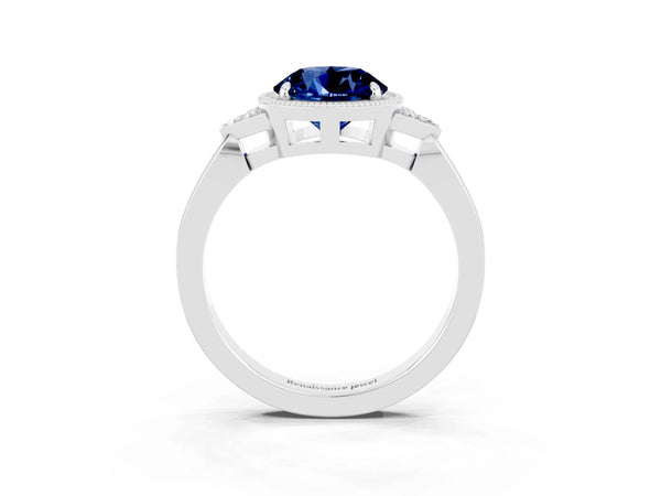Silver Round Cut Blue Sapphire Halo Ring with Tapered Band and Four-Prong Setting