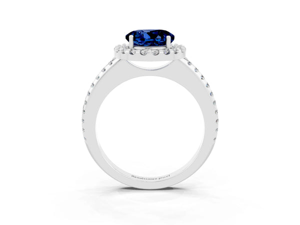 White gold Round Cut Blue Sapphire Pavé Halo Ring with Four-Prong Setting