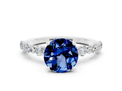 White gold Round Cut Blue Sapphire Prong Set Engagement Ring with Pavé Band