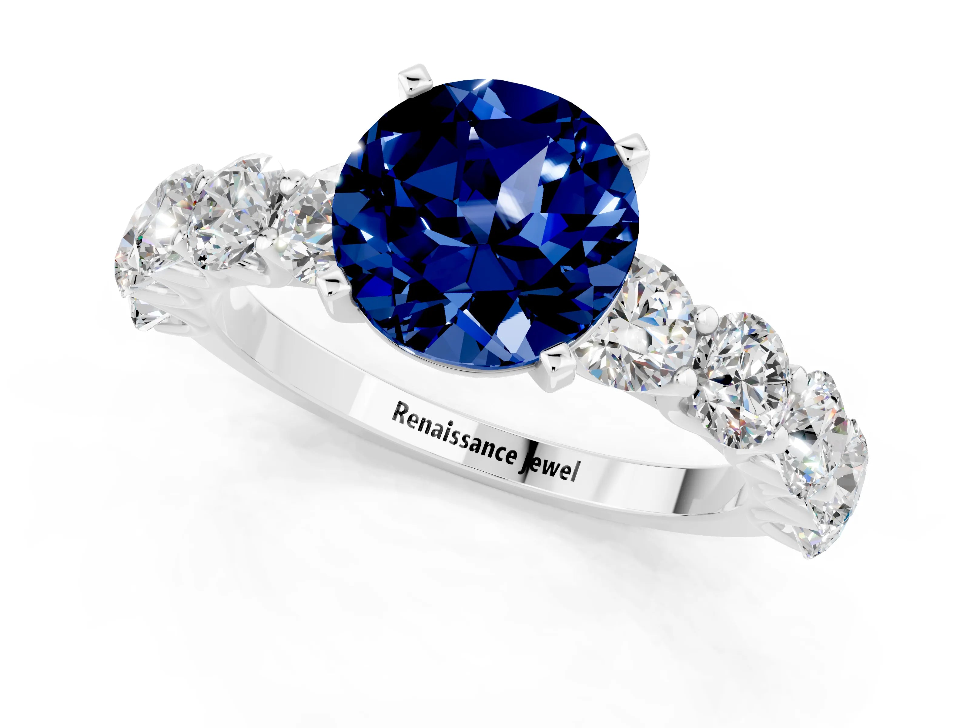 White gold Round Cut Blue Sapphire Prong Setting with Side Stones on a Pave Band_1