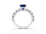 White gold Round Cut Blue Sapphire Prong Setting with Side Stones on a Pave Band_3