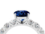 White gold Round Cut Blue Sapphire Prong Setting with Side Stones on a Pave Band_4