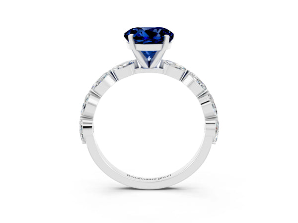 Silver Round Cut Blue Sapphire Ring with Marquise Side Stones and Prong Setting
