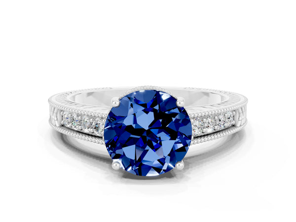 White gold Round Cut Blue Sapphire Ring with Milgrain Pavé Band and Four-Prong Setting