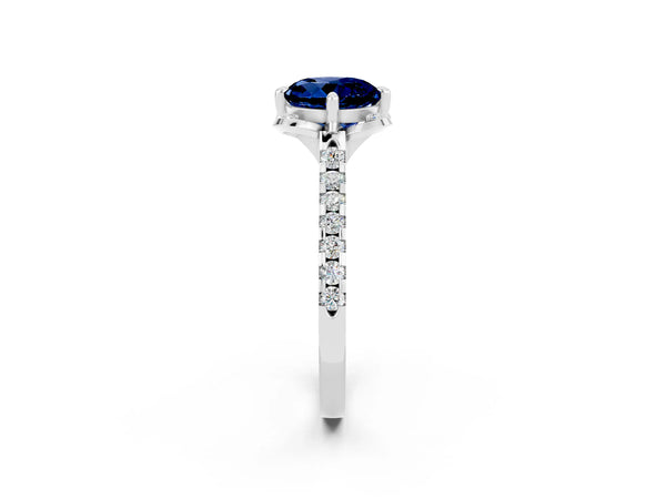 Platinum Round Cut Blue Sapphire Ring with Pavé Band and Floral Prong Setting