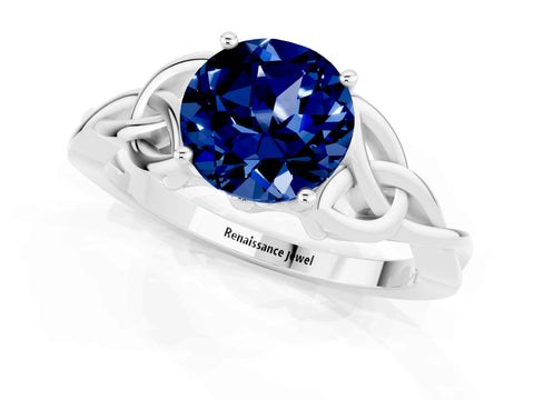 White gold Round Cut Blue Sapphire Solitaire Engagement Ring with Celtic Knot Band and Four-Prong Setting_1