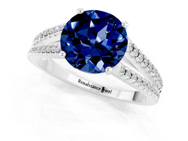 Platinum Round Cut Blue Sapphire Solitaire Engagement Ring with Split Shank Pavé Band