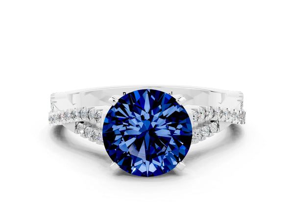 Silver Round Cut Blue Sapphire Solitaire Engagement Ring with Twisted Pavé Band and Four-Prong Setting