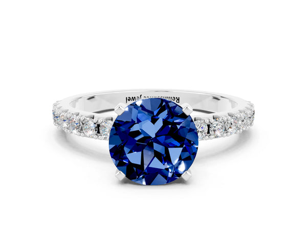 Platinum Round Cut Blue Sapphire Solitaire Pavé Band with Four-Prong Setting