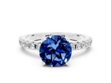 White gold Round Cut Blue Sapphire Solitaire Pavé Band with Four-Prong Setting