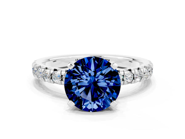 Silver Round Cut Blue Sapphire Solitaire Pavé Engagement Ring with Round Band and Prong Setting