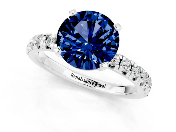 White gold Round Cut Blue Sapphire Solitaire Pavé Engagement Ring with Round Band and Prong Setting