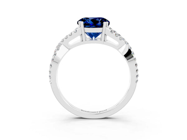 Platinum Round Cut Blue Sapphire Solitaire Ring with Four-Prong Setting and Twisted Pavé Band