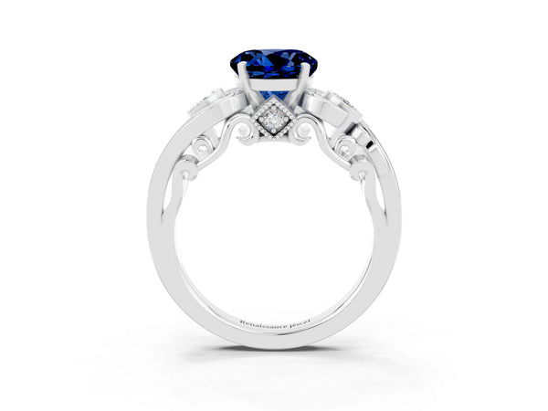 Silver Round Cut Blue Sapphire Solitaire Ring with Milgrain Pavé Band and Four-Prong Setting