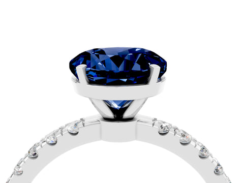 White gold Round Cut Blue Sapphire Solitaire Ring with Pavé Accents and Four-Prong Setting_4