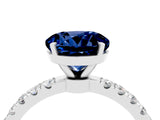 White gold Round Cut Blue Sapphire Solitaire Ring with Pavé Accents and Four-Prong Setting_4