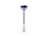 White gold Round Cut Blue Sapphire Solitaire Ring with Pavé Band and Four-Prong Setting_26