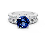 White gold Round Cut Blue Sapphire Solitaire Ring with Pavé and Channel Set Band