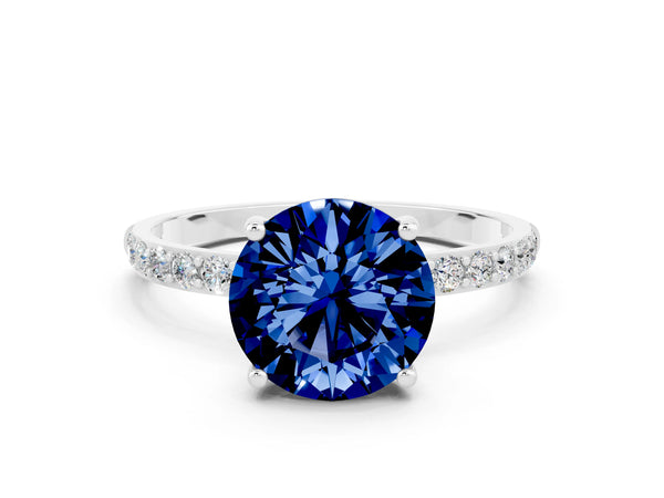 Silver Round Cut Blue Sapphire Solitaire Ring with Round  Pavé Band and Prong Setting