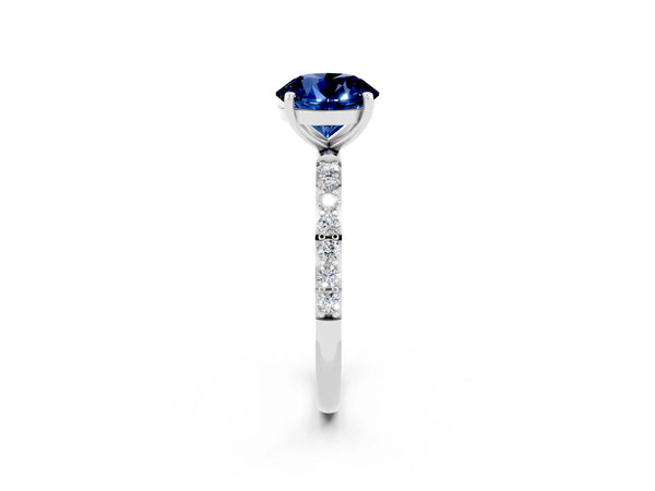 Silver Round Cut Blue Sapphire Solitaire Ring with Round  Pavé Band and Prong Setting