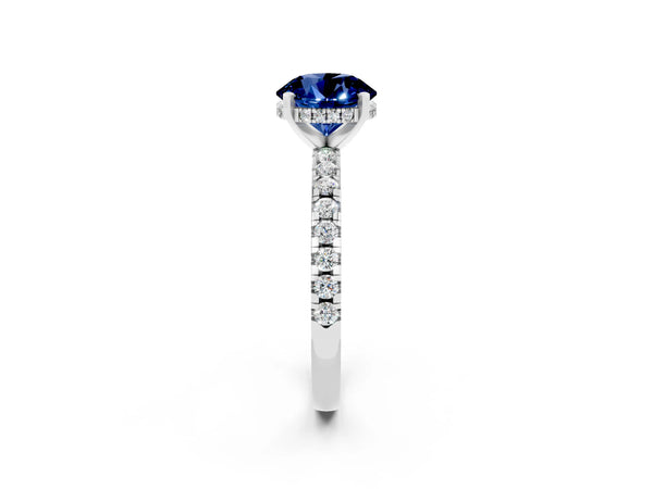 White gold Round Cut Blue Sapphire Solitaire Ring with Round Pavé Band and Four-Prong Setting
