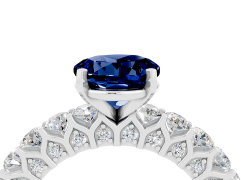 White gold Round Cut Blue Sapphire Solitaire Ring with Shared Prong Pavé Band and Four-Prong Setting_4