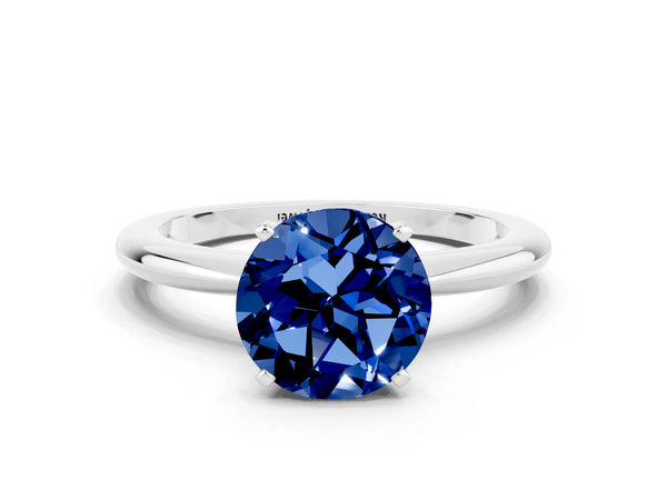 White gold Round Cut Blue Sapphire Solitaire Ring with Six-Prong Setting and Classic Band