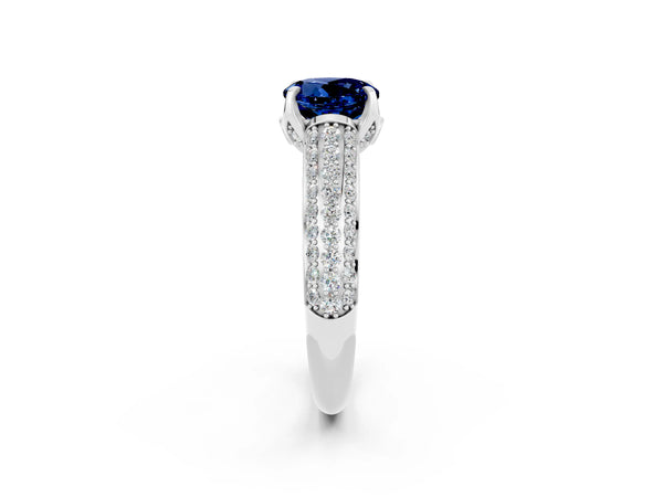 Silver Round Cut Blue Sapphire Solitaire Ring with Three-Row Pavé Band and Four-Prong Setting