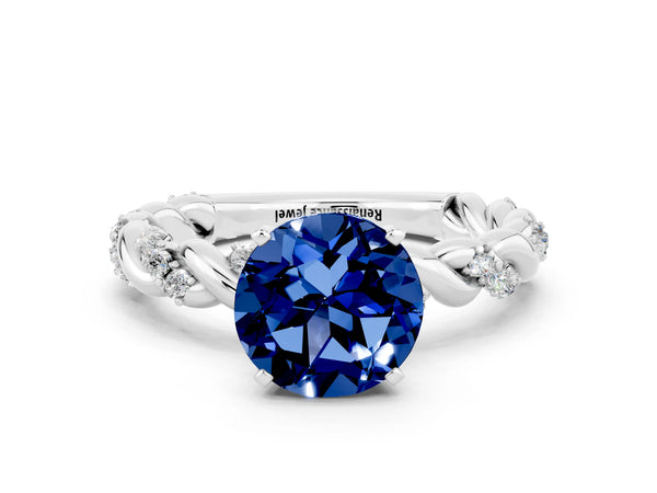 Platinum Round Cut Blue Sapphire Solitaire Ring with Twisted Band and Pavé Accents