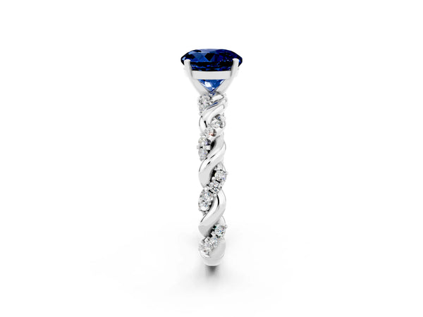 White gold Round Cut Blue Sapphire Solitaire Ring with Twisted Band and Pavé Accents
