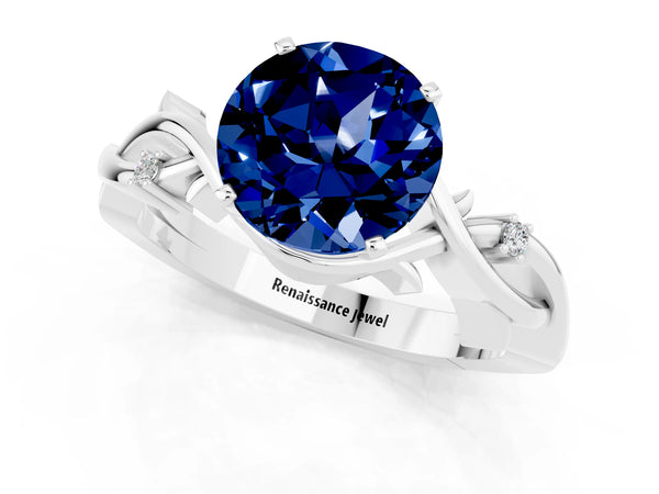 Platinum Round Cut Blue Sapphire Solitaire Ring with Twisted Band and Prong Setting