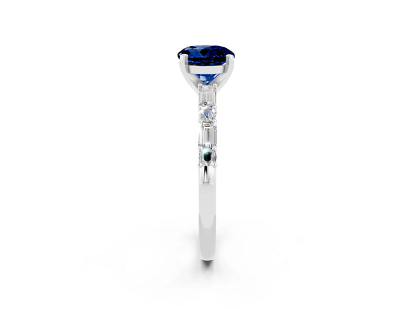 Platinum Round Cut Blue Sapphire Solitaire with Side Baguettes and Channel Set Band