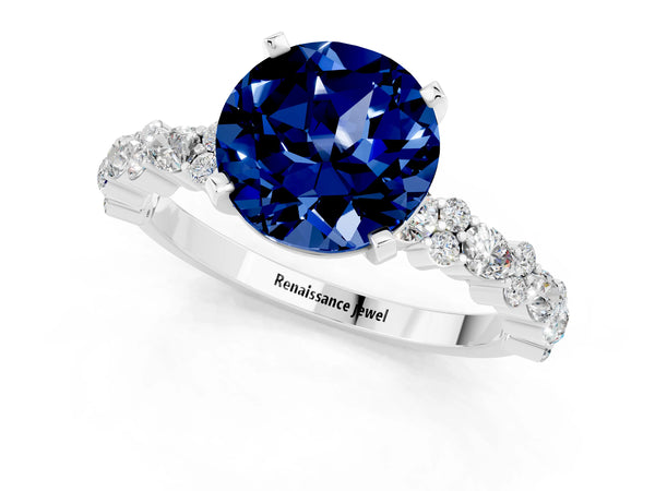 Silver Round Cut Blue Sapphire Side Stone Solitaire Ring with Round  and Four-Prong Setting