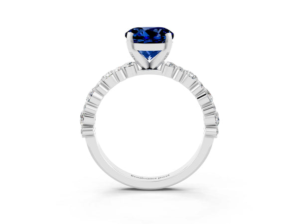 Silver Round Cut Blue Sapphire Side Stone Solitaire Ring with Round  and Four-Prong Setting