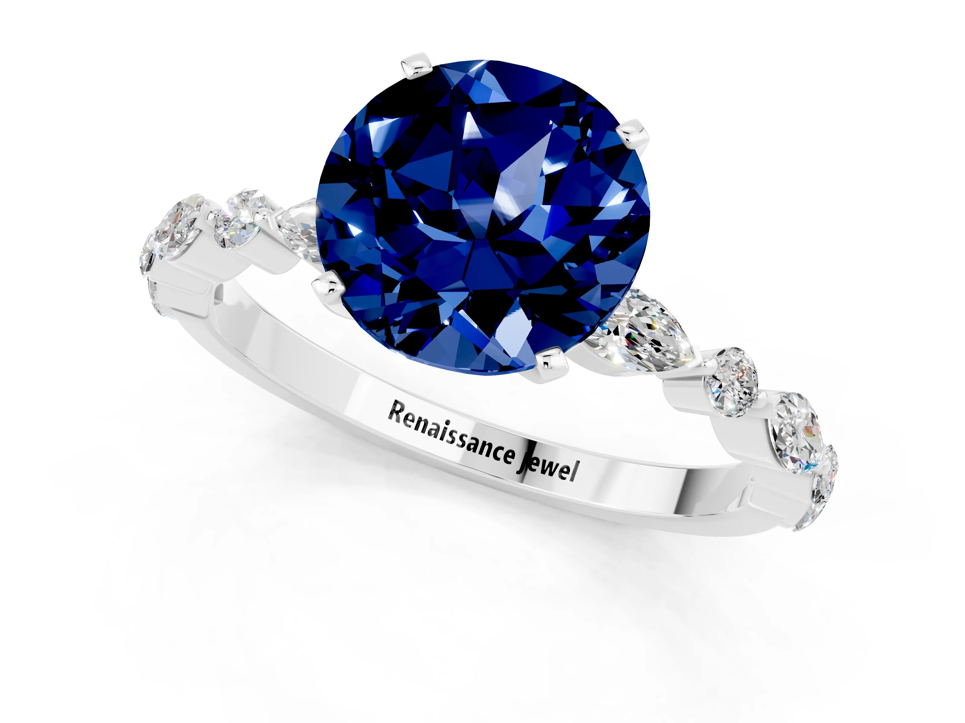 White gold Round Cut Blue Sapphire Solitaire with Side Stones on a Pavé Band and Four-Prong Setting_1