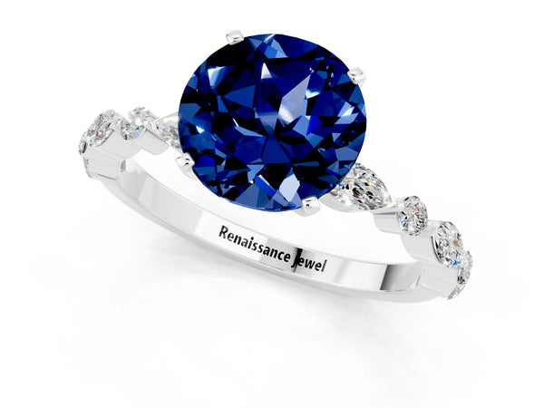 Silver Round Cut Blue Sapphire Ring with Marquise and Round  Side Stones and Four-Prong Setting