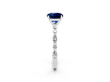 White gold Round Cut Blue Sapphire Solitaire with Side Stones on a Pavé Band and Four-Prong Setting_2