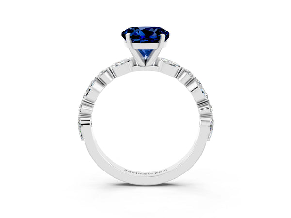 Platinum Round Cut Blue Sapphire Ring with Marquise and Round  Side Stones and Four-Prong Setting