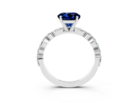 White gold Round Cut Blue Sapphire Solitaire with Side Stones on a Pavé Band and Four-Prong Setting_3