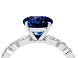 White gold Round Cut Blue Sapphire Solitaire with Side Stones on a Pavé Band and Four-Prong Setting_4