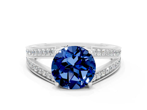 White gold Round Cut Blue Sapphire Split Shank Ring with Pavé Band and Four-Prong Setting