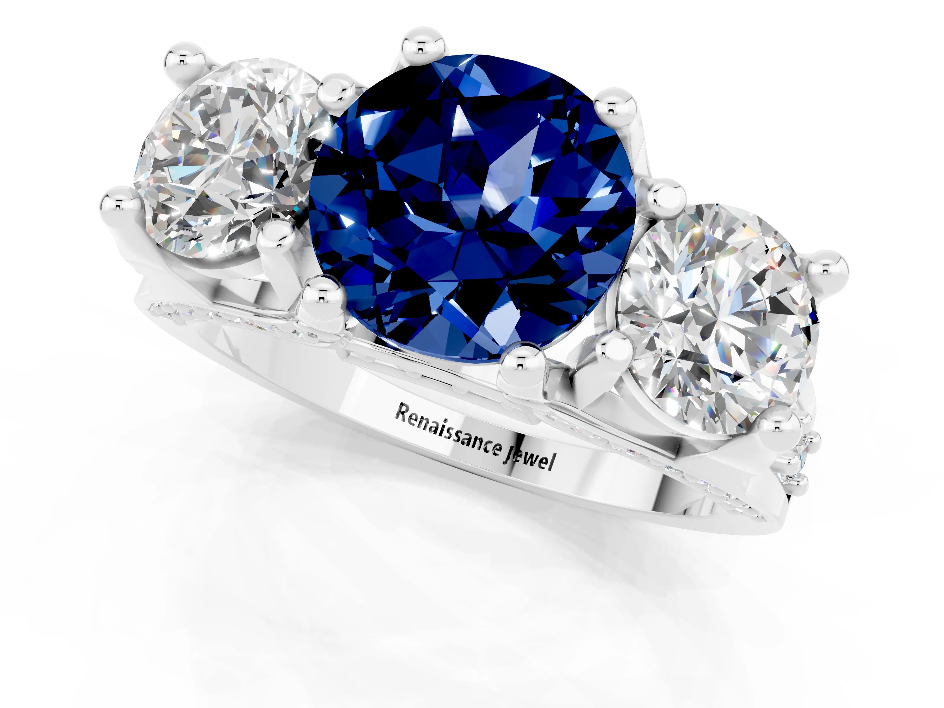 White gold Round Cut Blue Sapphire Three-Stone Ring with Channel Set Band and Four-Prong Setting_1